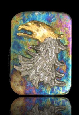 Phoenix,<br />Gold lustre and Silver metal clay on glass clay on irrid