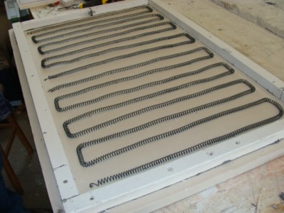 DSC02479.jpg (116.17 KiB) Viewed 49069 times new lid liner viewed from underneath with elements reinstalled. The elements are held snug to the liner with 'u' shaped wire loops poked through from the underside and bent at 90 deg. on top so they don't dislodge.